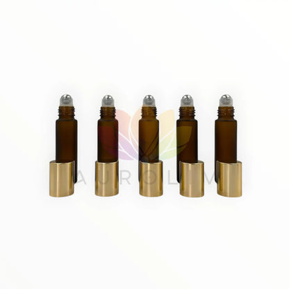 Roll on 10ml ambar empavonado vidrio grueso tapa dorada